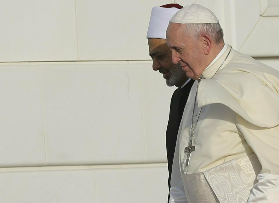 Pope Francis, right, and the Grand Imam of Al Azhar Ahmed el-Tayeb arrive at the Sheikh Zayed Grand Mosque in Abu Dhabi, United Arab Emirates, Monday, Feb. 4, 2019. Francis travelled to Abu Dhabi to participate in a conference on inter religious dialogue sponsored the Emirates-based Muslim Council of Elders, an initiative that seeks to counter religious fanaticism by promoting a moderate brand of Islam. (AP Photo/Kamran Jebreili)