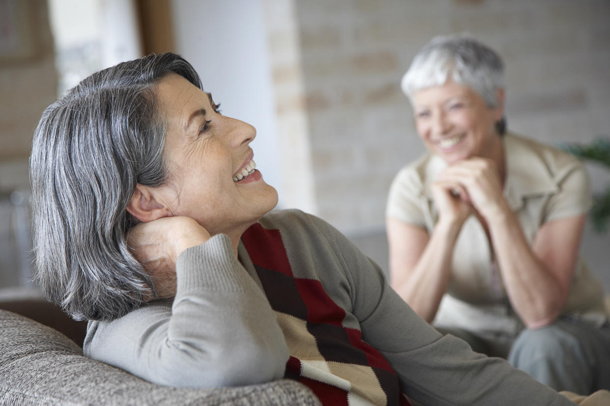 Women embracing their gray hair. (Getty Images)