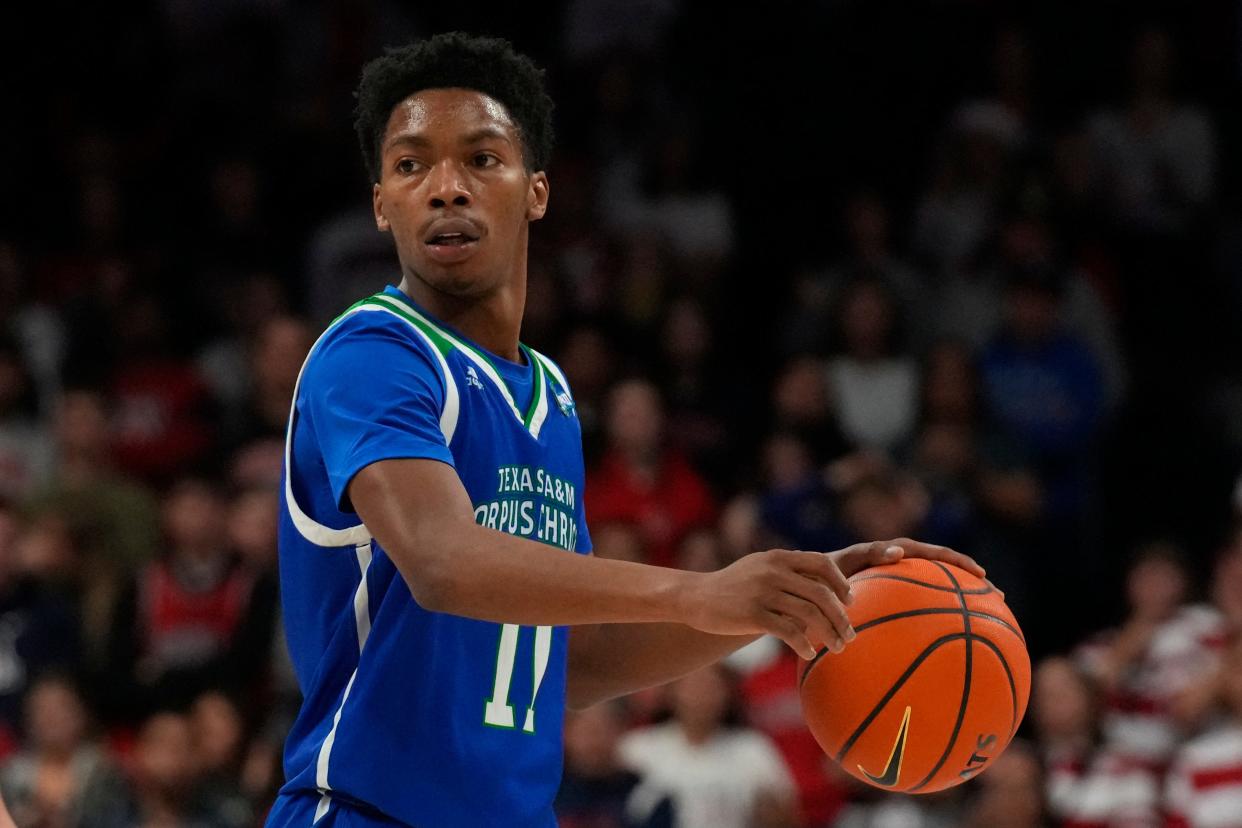 Texas A&M Corpus Christi guard Terrion Murdix (11) during the first half of an NCAA college basketball game against Arizona, Tuesday, Dec. 13, 2022, in Tucson, Ariz. (AP Photo/Rick Scuteri)