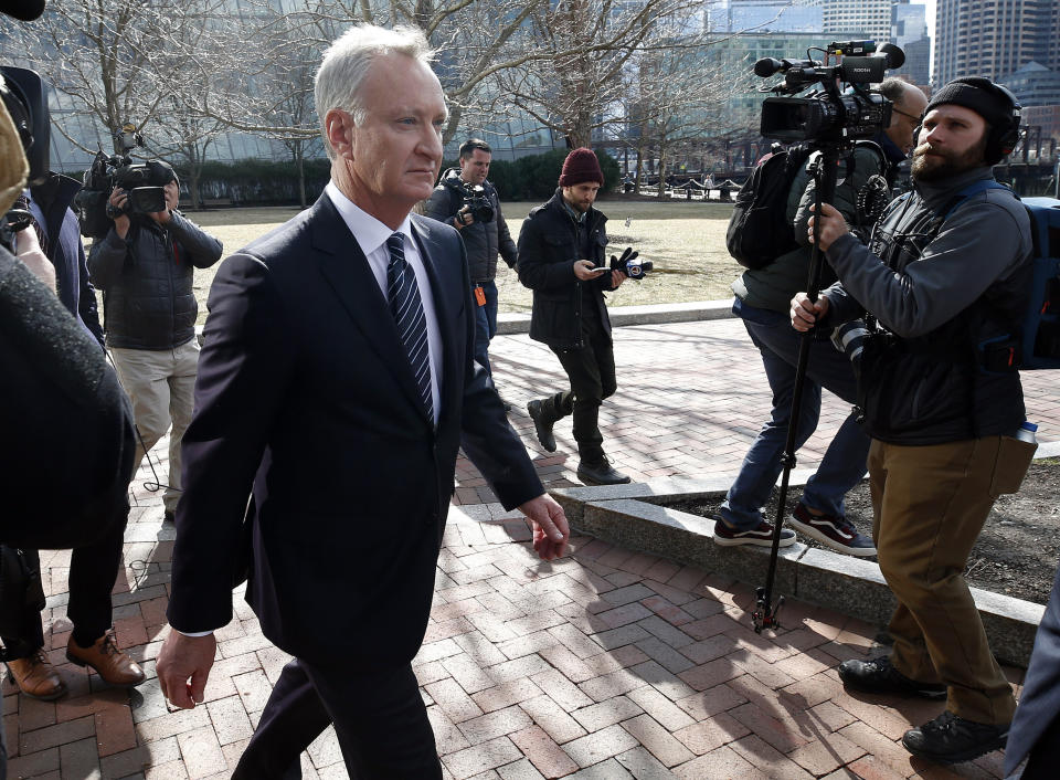 FILE - In this April 3, 2019 file photo, TobyMacFarlane departs federal court in Boston after facing charges in a nationwide college admissions bribery scandal. Authorities said Tuesday, April 23, that MacFarlane, a former senior executive at a title insurance company, will plead guilty to racketeering conspiracy and cooperate with federal authorities in the case. (AP Photos/Michael Dwyer, File)