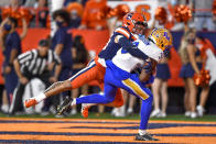 Pittsburgh wide receiver Jordan Addison, right, catches a touchdown pass while covered by Syracuse defensive back Aman Greenwood (26) during the first half of an NCAA college football game in Syracuse, N.Y., Saturday, Nov. 27, 2021. (AP Photo/Adrian Kraus)