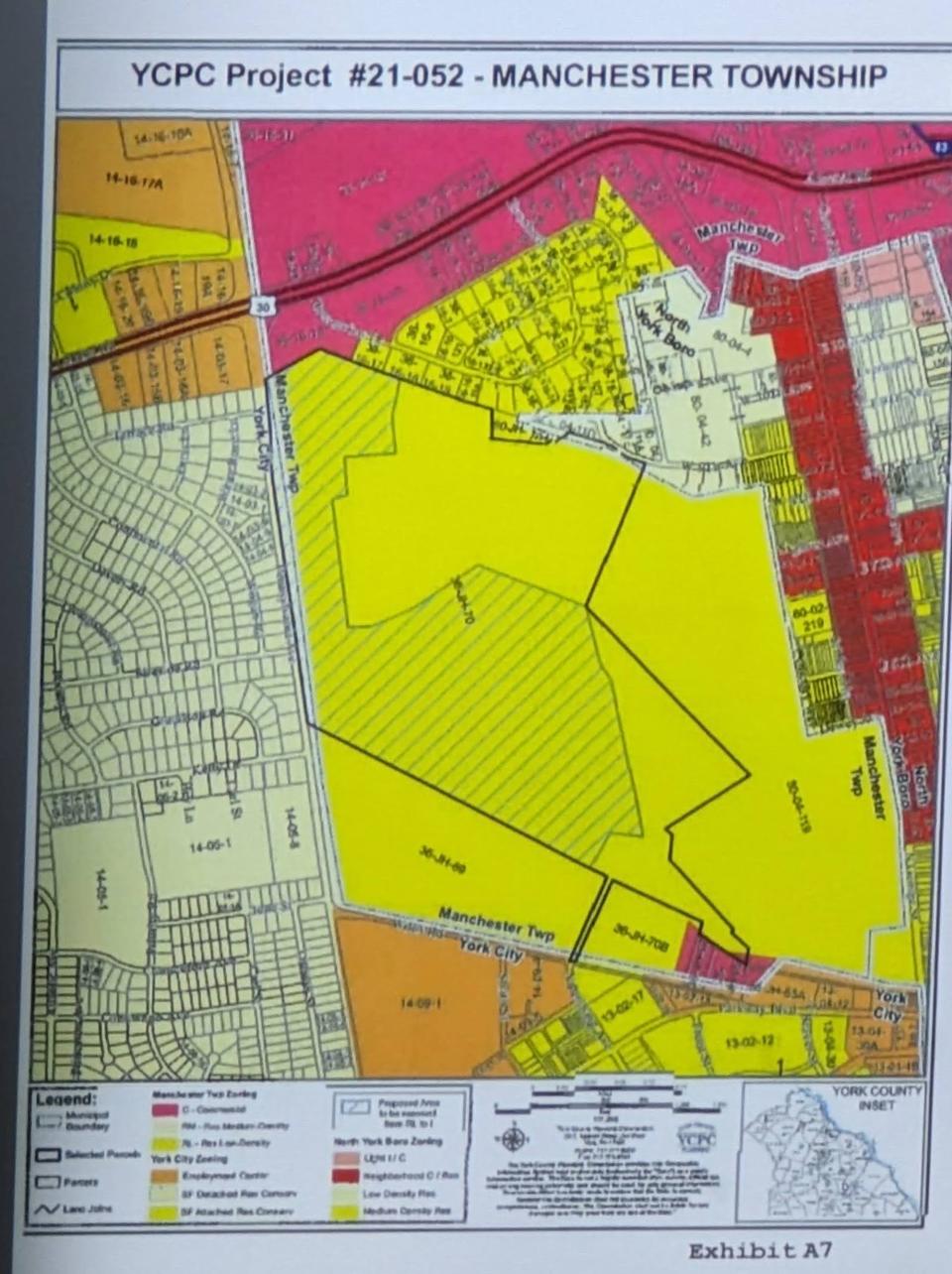 A zoning map that was used during a presentation that shows the rezoned land (in green slashes) that was subdivided, sold and rezoned off of Prospect Hill Cemetery.