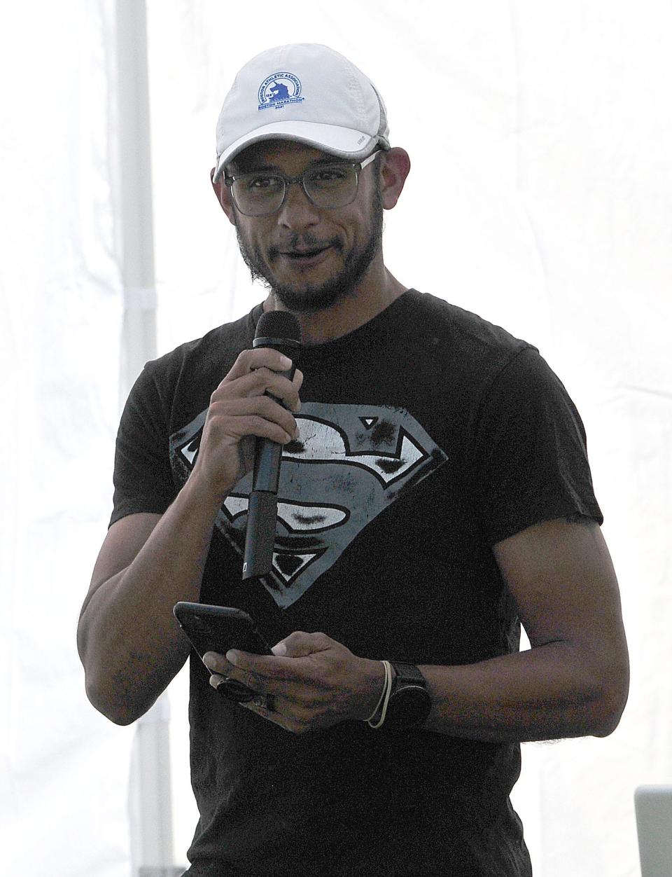 Cancer survivor Joe Ortiz recounts his experiences to those gathered for the Relay for Life opening ceremony  Saturday, June 4, 2022 at the Ashland County Fairgrounds. LIZ A. HOSFELD/FOR TIMES-GAZETTE.COM