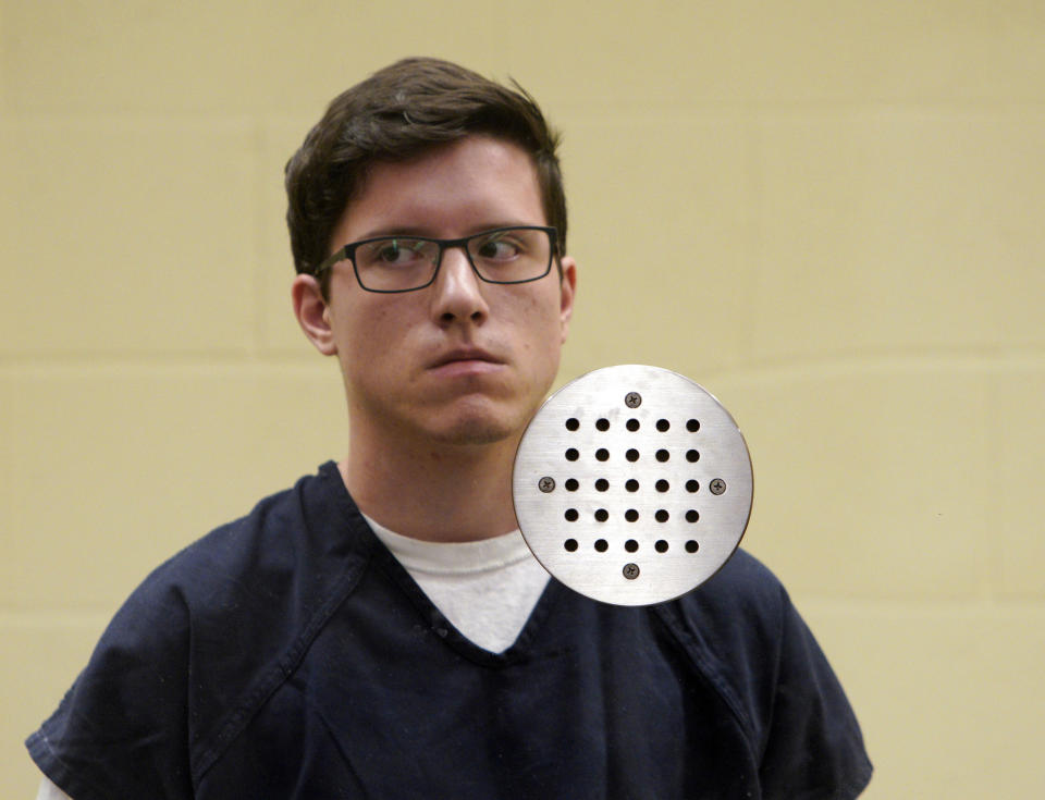 FILE - In this April 30, 2019 file photo, John T. Earnest appears for his arraignment hearing in San Diego. Earnest, a 19-year-old nursing student who opened fire at a California synagogue didn't have a valid hunting license, which is the only way someone under 21 who isn't in the military or law enforcement can legally buy a weapon under state law. The California Fish and Wildlife Department said Wednesday, Aug. 14, 2019, that Earnest was issued a hunting license, but it had not gone into effect yet. He has pleaded not guilty to murder and attempted murder. (Nelvin C. Cepeda/The San Diego Union-Tribune via AP, Pool, File)