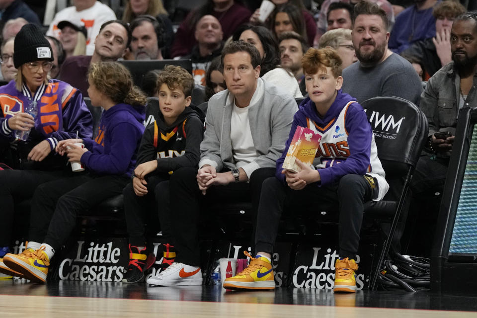 Phoenix Suns owner Mat Ishbia watches the game between the Detroit Pistons and the Phoenix Suns during the first half of an NBA basketball game, Sunday, Nov. 5, 2023, in Detroit. (AP Photo/Carlos Osorio)