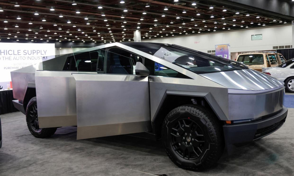 <span>Tesla Cybertruck on display at the SAE WCX conference in Detroit, Michigan, on 18 April 2024.</span><span>Photograph: Rebecca Cook/Reuters</span>