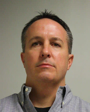 Barry Cadden is seen in this booking photo released by Wrentham Police Department in Wrentham, Massachusetts, U.S. on March 7, 2017. Courtesy Wrentham Police Department/Handout via REUTERS