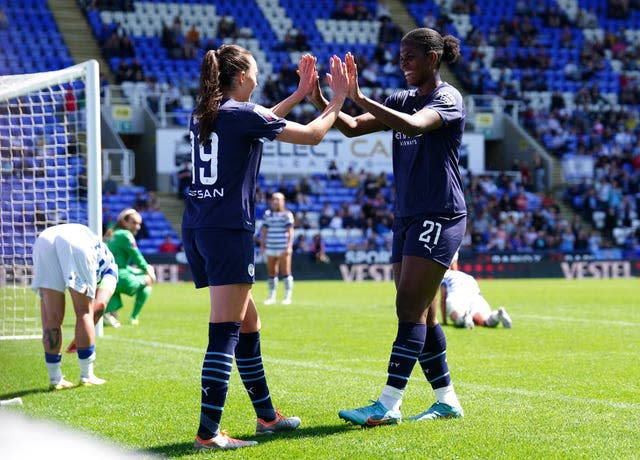 Khadija Shaw (right) celebrates her goal 