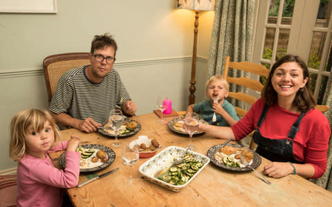 Hattie Garlick being taught by food stylist and cook Rosie Birkett on how to feed her family of four organically on a budget  - Credit: Heathcliff O'Malley