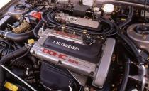 One not-very-secret element in the Galant VR-4’s success was Mitsubishi’s 4G63T turbocharged 2.0-liter DOHC 16-valve engine. With its twin counter-rotating balance shafts and rugged iron block, the 4G63 could be modified to make big power reliably despite massive amounts of turbocharger boost. This photo is of the 4G63T as installed in the <a href="http://www.caranddriver.com/comparisons/honda-prelude-si-vs-ford-probe-gt-mazda-mx-6-ls-mitsubishi-eclipse-gsx-volkswagen-corrado-slc-comparison-test" rel="nofollow noopener" target="_blank" data-ylk="slk:1992 Mitsubishi Eclipse GSX;elm:context_link;itc:0;sec:content-canvas" class="link ">1992 Mitsubishi Eclipse GSX</a>—the Illinois-built, egg-shaped AWD coupe companion to the Galant VR-4. In the 1992 Eclipse, the engine was rated at 195 horsepower. Versions of the 4G63T would power every Lancer Evolution from Evo I to Evo IX.