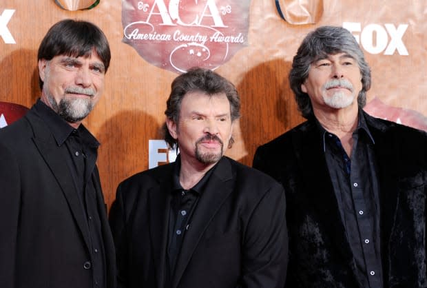(L-R) Musicians Teddy Gentry, Jeff Cook and Randy Owen of <a href="https://parade.com/1239349/michelleparkerton/music-quotes/" rel="nofollow noopener" target="_blank" data-ylk="slk:music;elm:context_link;itc:0;sec:content-canvas" class="link ">music</a> group Alabama<p><a href="https://www.gettyimages.com/detail/134992294" rel="nofollow noopener" target="_blank" data-ylk="slk:Frazer Harrison/Getty Images;elm:context_link;itc:0;sec:content-canvas" class="link ">Frazer Harrison/Getty Images</a></p>