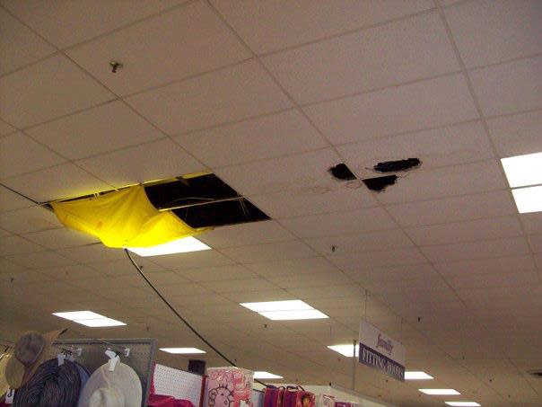 June, 3rd, 2012. Wet, damaged, tiles in Zellers.