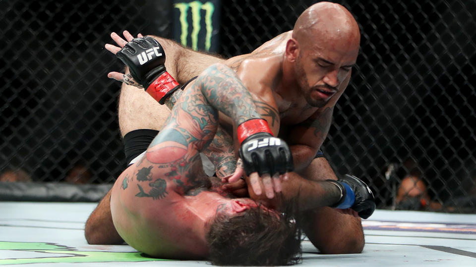 Mike Jackson dominates CM Punk from the top position. Pic: Getty