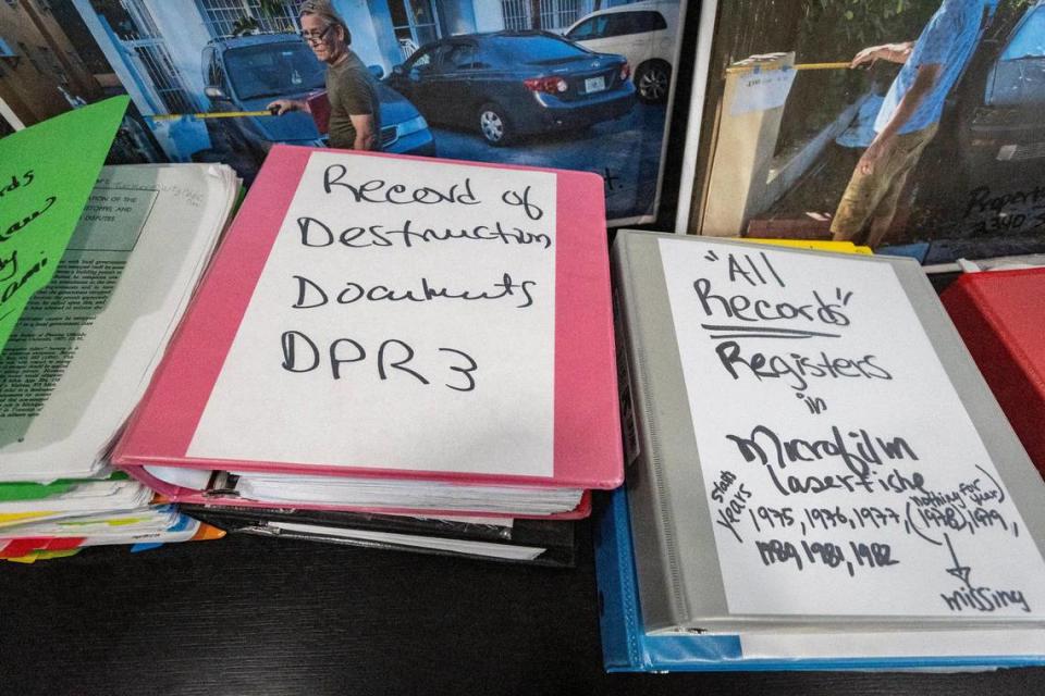 Some of the binders and photos detailing Zahary Pacheco’s battle over code enforcement issues.