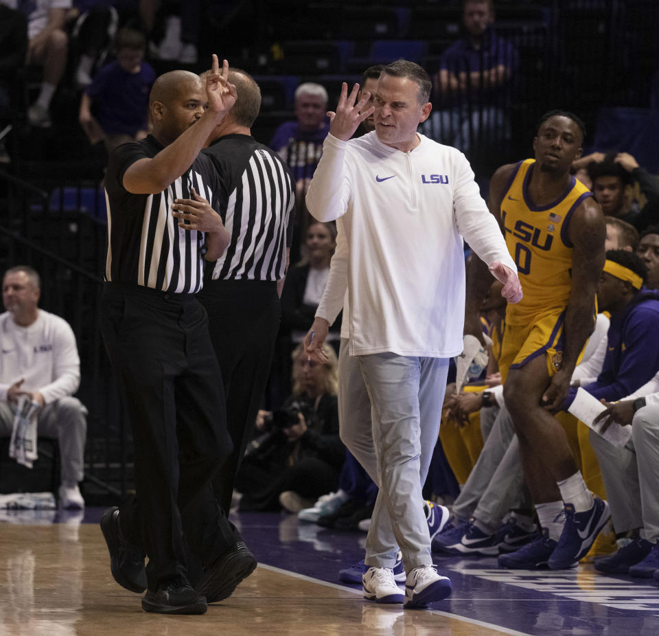 LSU head coach Matt McMahon exchanges words with game officials after a call during an NCAA college basketball game against Kansas State, Saturday, Dec. 9, 2023, at the LSU PMAC in Baton Rouge, La. (Hilary Scheinuk/The Advocate via AP)