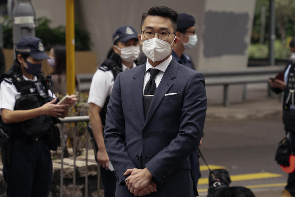 Pro-democracy activist Michael Pang Cheuk-kei arrives at the West Kowloon Magistrates' Courts to attend his national security trial in Hong Kong, Monday, Feb. 6, 2023. Some of Hong Kong's best-known pro-democracy activists went on trial Monday in the biggest prosecution yet under a law imposed by China's ruling Communist Party to crush dissent. (AP Photo/Anthony Kwan)