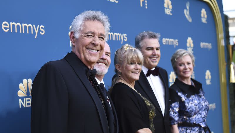 Barry Williams, left, Mike Lookinland, Maureen McCormick, Christopher Knight, Eve Plumb arrive at the 74th Emmy Awards on Sept. 12, 2022, at the Microsoft Theater in Los Angeles.