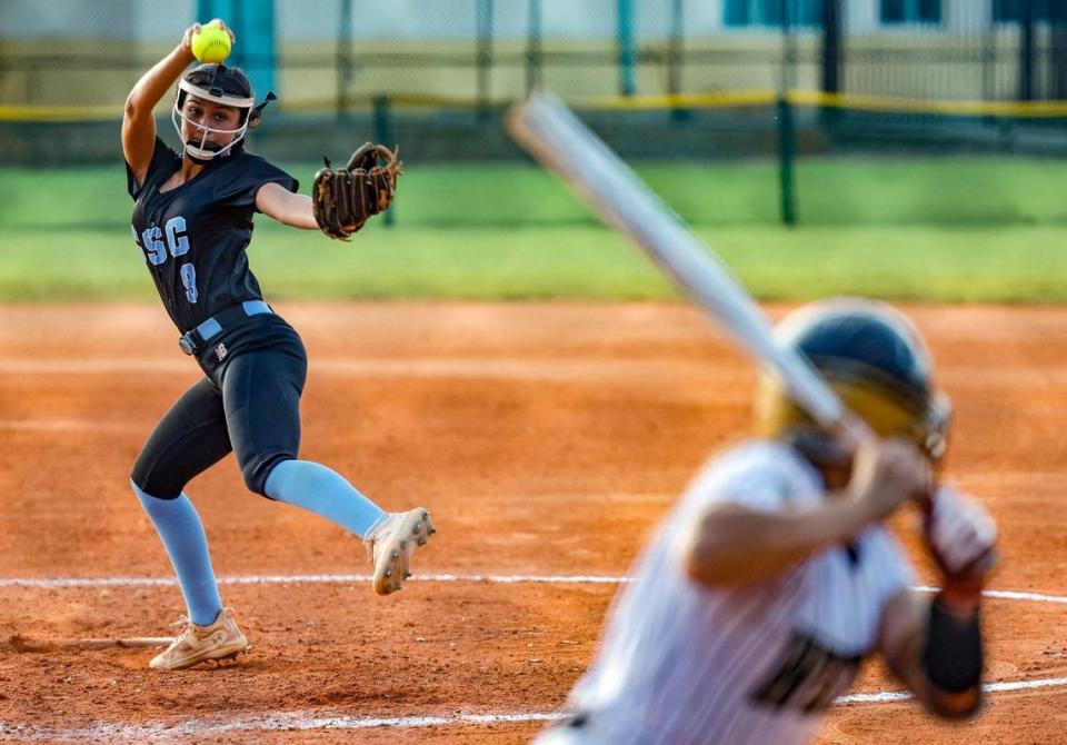 Coral Springs Charter pitcher Sophia Bertorelli (9) winds up to pitch against Western during the BCAA Big 8 softball championship game at Pompano Beach Community Park in Pompano Beach on Thursday, April 27, 2023.