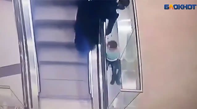The moment the aunt can't hold on captured on CCTV. Source: Supplied