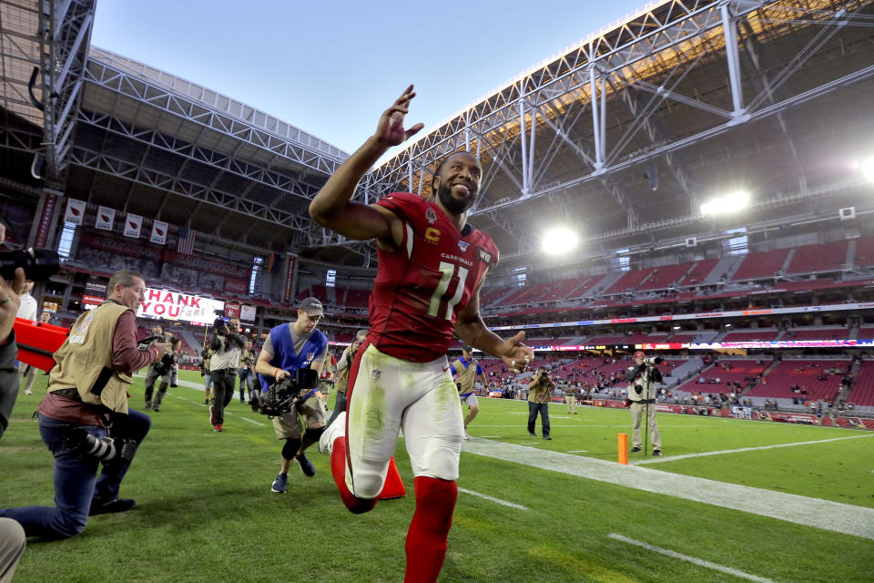 Arizona Cardinals wide receiver Larry Fitzgerald (11) leave the field after f an NFL football game against the Cleveland Browns, Sunday, Dec. 15, 2019, in Glendale, Ariz. The Cardinals won 38-24. (AP Photo/Ross D. Franklin)
