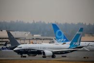 A Boeing 737 MAX aircraft takes off during an evaluation flight in Seattle