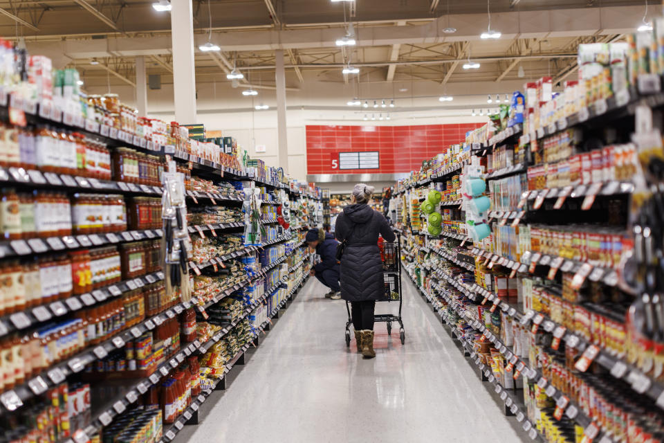 A customer browses an aisle at a Metro grocery store In Toronto on Friday, Feb. 2, 2024.   THE CANADIAN PRESS/Cole Burston