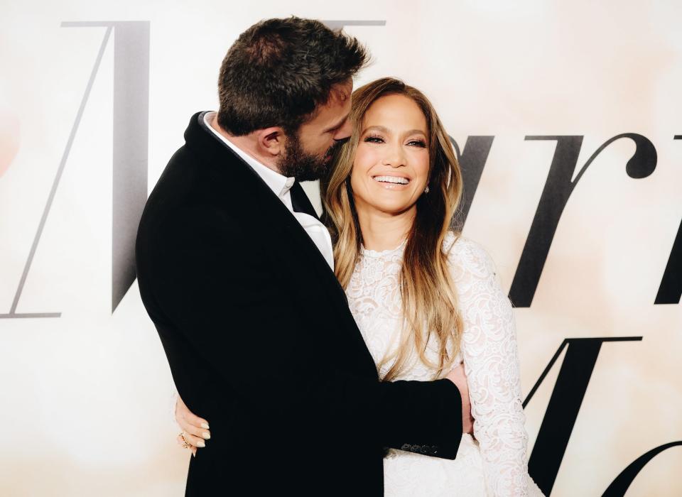 A close-up of Ben and Jennifer embracing