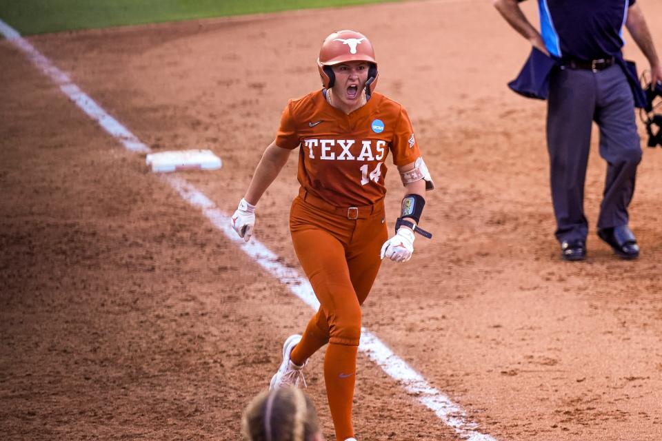 Texas catcher Reese Atwood celebrates a home run during the Longhorns' win over Texas A&M in a super regional series at McCombs Field this past weekend. Atwood, a sophomore, became the second Texas player to ever win USA Softball's collegiate player of the year honor, the organization announced Monday.