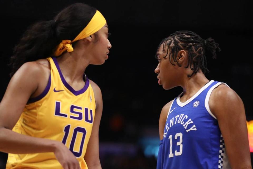 Kentucky’s Ajae Petty (13) squares off against LSU’s Angel Reese (10) during Sunday’s game in Baton Rouge, Louisiana. Petty, who transferred from LSU to UK, finished with 13 points and 15 rebounds. Reese, one of the stars of the Tigers’ national championship run last season, put up 22 points and 14 boards against the Wildcats on Sunday.