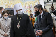 U.S. Secretary of State Antony Blinken, right, accompanied by the Head of the Independent Ukrainian Church Metropolitan Epiphanius, second left, visits the Mikhailovsky Zlatoverkhy Cathedral (St. Michael's Golden-Domed Cathedral) in Kyiv, Ukraine, Thursday, May 6, 2021. (AP Photo/Efrem Lukatsky, Pool)