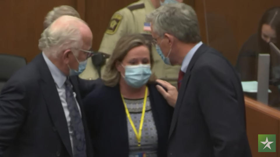 FILE - In this screen grab from video, former Brooklyn Center Police Officer Kim Potter center, with defense attorney Earl Gray, left, and Paul Engh talk after the verdict is read December, 23, 2021 in Potter's trial for the April 11, 2021, death of Daunte Wright, at the Hennepin County Courthouse in Minneapolis, Minn. Prosecutors appear to have backed away from their pursuit of a longer-than-usual sentence for Potter. In a filing this week ahead of her Friday Feb. 18, 2022, sentencing, they argued for the presumptive sentence of a little over seven years for her first-degree manslaughter conviction. (Court TV, via AP, Pool File)