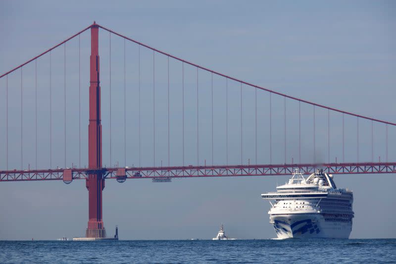 The Grand Princess cruise ship carrying passengers who have tested positive for coronavirus arrives past the Golden Gate bridge in San Francisco