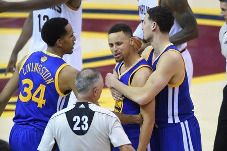 Golden State Warriors guard Stephen Curry (30) reacts after fouling out of the game in the fourth quarter of game six of the NBA Finals against the Cleveland Cavaliers at Quicken Loans Arena. Mandatory Credit: Ken Blaze-USA TODAY Sports