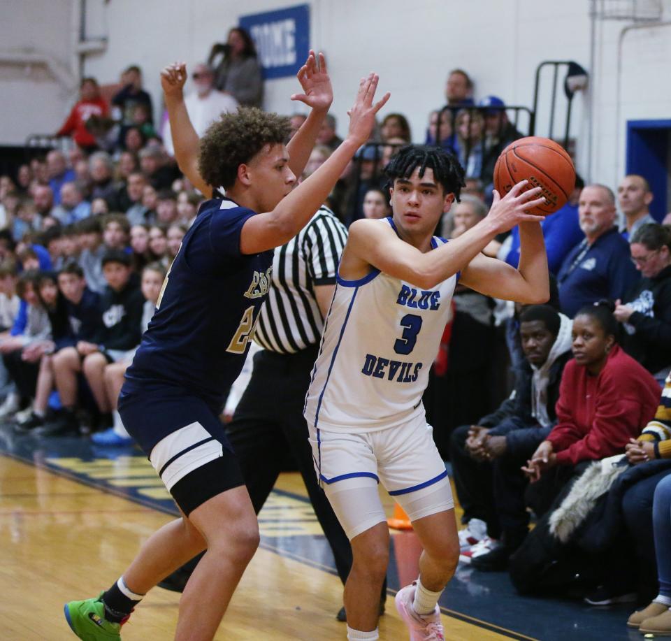 Haldane's Benjamin Bozsik is covered by Beacon's Joseph Battle during Friday's game on January 27, 2023.