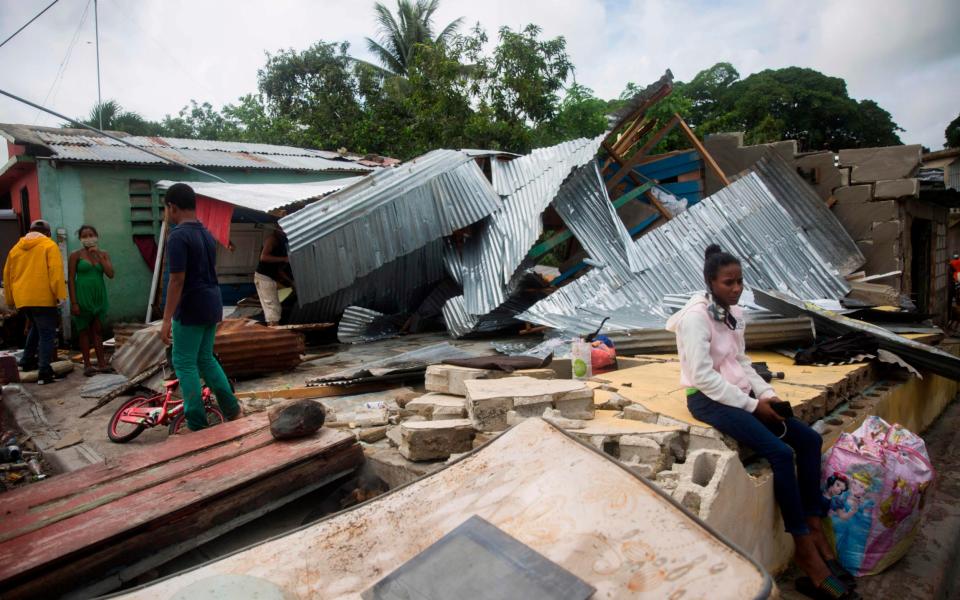 Destroyed houses in the aftermath of storm Isaias in the Dominican Republic  - Erika Santelices/AFP