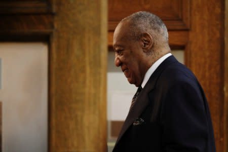 FILE PHOTO: Actor and comedian Bill Cosby returns to the courtroom after a recess on the sixth day of his sexual assault retrial at the Montgomery County Courthouse in Norristown, Pennsylvania, U.S., April 16, 2018.  REUTERS/Dominick Reuter/Pool