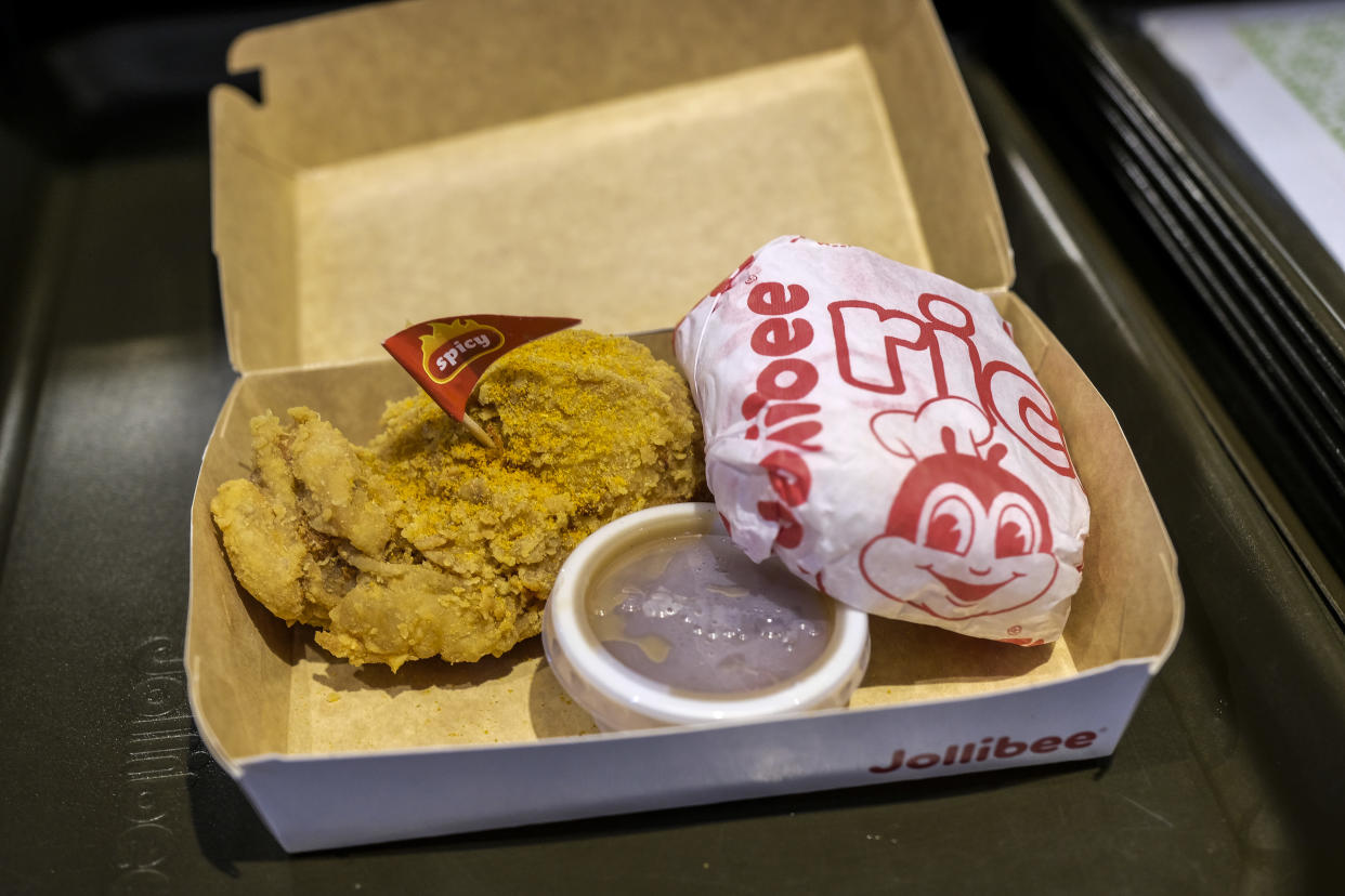 A fried chicken meal at a Jollibee Foods Corp. restaurant in Taguig City, Manila, the Philippines, on Saturday, March 13, 2021. (Photographer: Veejay Villafranca/Bloomberg)