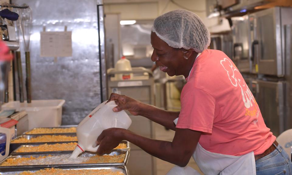 In a file photo, Sonja Denise Hunter prepares a dish at Wade's Restaurant in Spartanburg. She has worked at Wade's for more than 25 years.