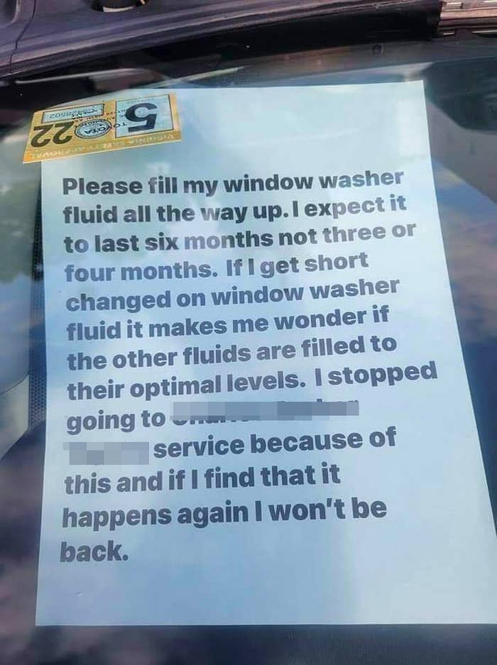 Note from the owner of a car saying, "Please fill my window washer fluid all the way up. If I get short changed on window washer fluid it makes me wonder if the other fluids are filled to their optimal levels."