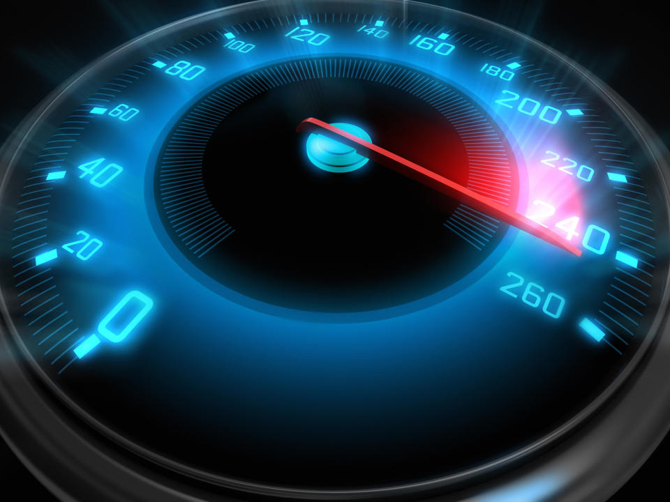 A glowing speedometer with the needle pointing toward 260.