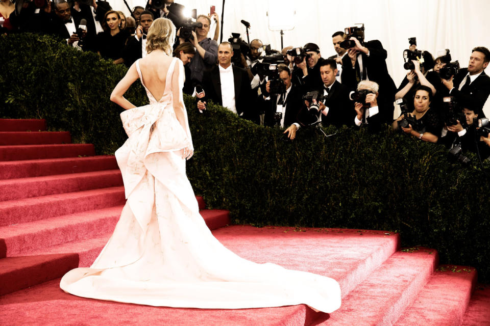 The annual Costume Institute Gala at the Metropolitan Museum of Art in New York is an opportunity for stars to wear opulent or outrageous gowns that are perhaps deemed too much for a traditional red carpet event. Swift chose an embellished pink de la Renta gown with a bustle and long train for this year’s Charles James-themed event.