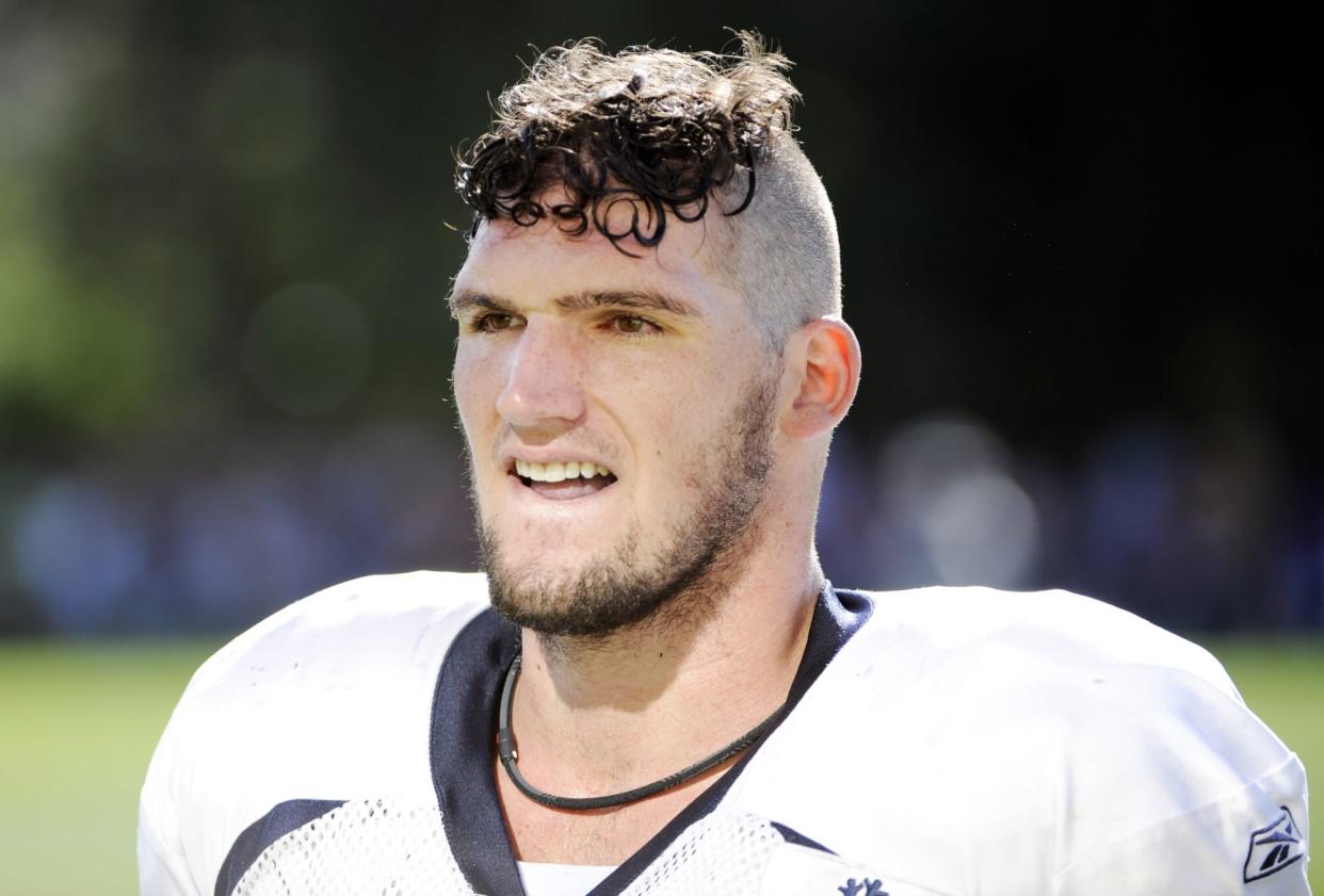 Denver Broncos rookie offensive lineman Paul Duncan from Notre Dame sports his new haircut during NFL football training camp at Broncos headquarters in Englewood, Colo., Tuesday, Aug. 10, 2010. Rookies received new haircuts from veterans Saturday. (AP Photo/Jack Dempsey)