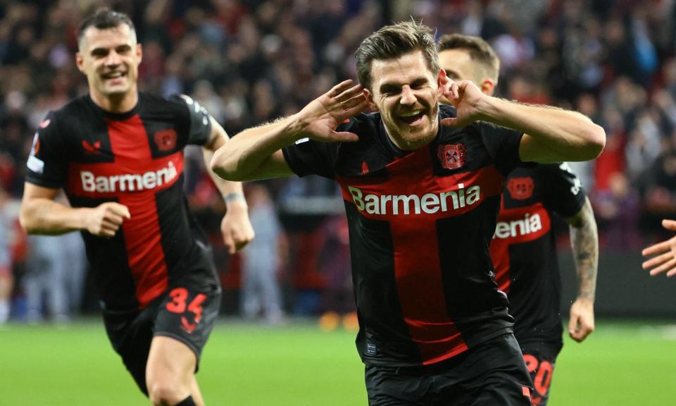 <span>Jonas Hofmann celebrates after opening the scoring for Leverkusen in the 83rd minute.</span><span>Photograph: Wolfgang Rattay/Reuters</span>