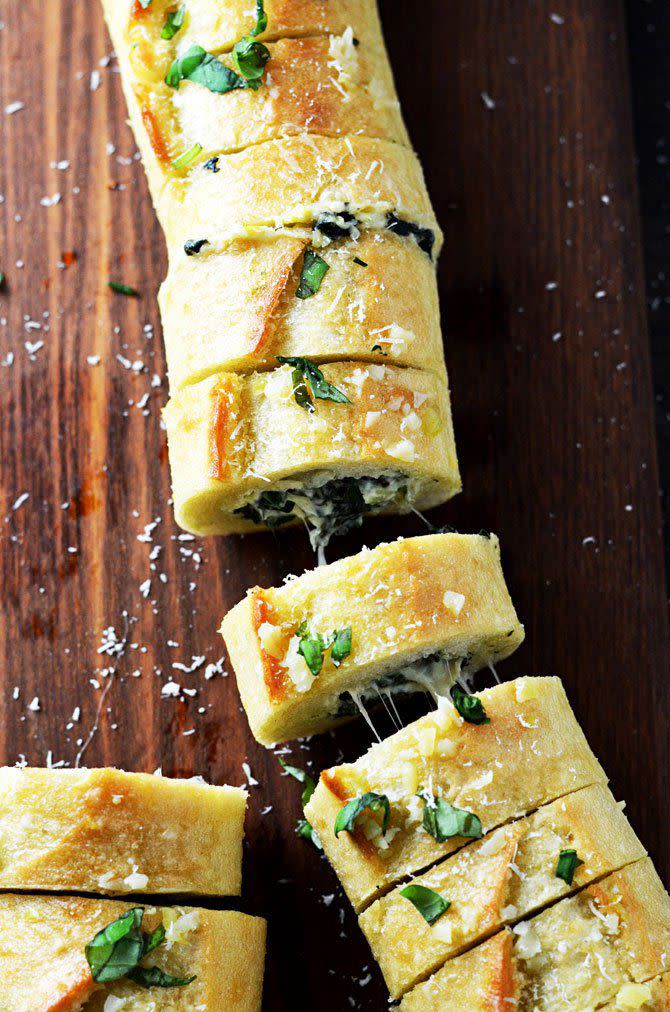 Spinach and Artichoke Dip Stuffed Garlic Bread