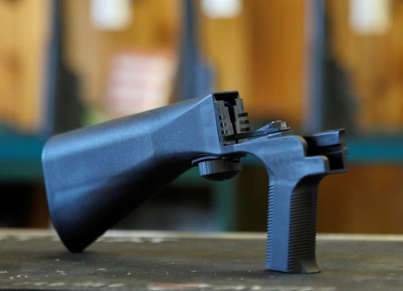 FILE PHOTO: A bump fire stock that attaches to a semi-automatic rifle to increase the firing rate is seen at Good Guys Gun Shop in Orem