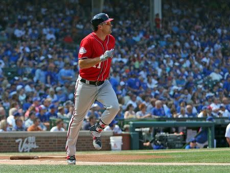 Aug 11, 2018; Chicago, IL, USA; Washington Nationals first baseman Ryan Zimmerman (11) watches his 2 run home run during the first inning against the Chicago Cubs at Wrigley Field. Mandatory Credit: Dennis Wierzbicki-USA TODAY Sports