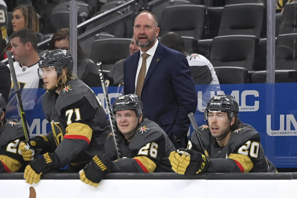 FILE - Vegas Golden Knights coach Peter DeBoer watches from the bench during the third period of the team's NHL hockey game against the Nashville Predators on Thursday, March 24, 2022, in Las Vegas. The Dallas Stars announced Tuesday, June 21, 2022, that they have hired Peter DeBoer as their new coach, a month after he was fired by the Vegas Golden Knights. (AP Photo/David Becker, File)