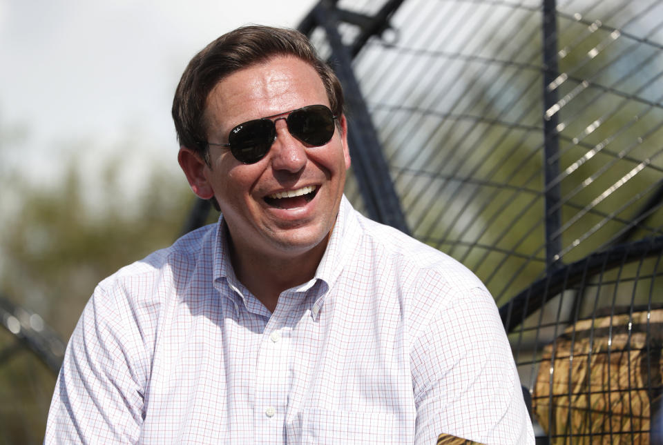 FILE - In this Sept. 12, 2018, file photo, Republican candidate for Florida Governor Ron DeSantis smiles during an airboat tour of the Florida Everglades in Fort Lauderdale, Fla. Top Florida Republicans have been quick to say President Donald Trump is wrong about the death toll in Puerto Rico. DeSantis, who won the GOP primary for governor with Trump’s endorsement, also said the president is not correct. (AP Photo/Wilfredo Lee, File)