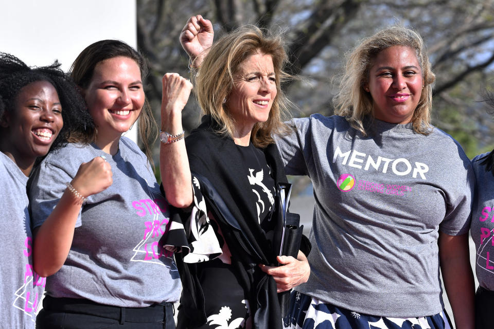 Caroline Kennedy poses with greeters from a mentoring organization as she arrives for a ceremony where, arrives for a ceremony where, Speaker of the House Nancy Pelosi, D-Calif., receives the 2019 John F. Kennedy Profile in Courage Award during ceremonies at the John F. Kennedy Presidential Library and Museum, Sunday, May 19, 2019, in Boston. (AP Photo/Josh Reynolds)
