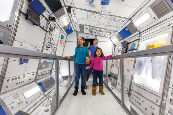 In the new exhibit "Journey to Space" at the California Science Center, guests step inside a full-size replica of the International Space Station's Destiny Lab as it rotates around them, giving a hint at what astronauts experience in space.